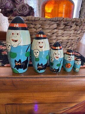 Witch nesting dolls with black cat